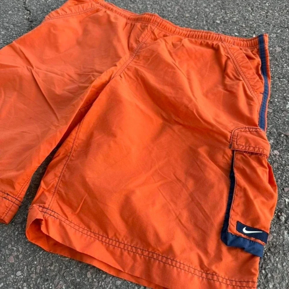 Vintage Nike orange and blue shorts Size L‎